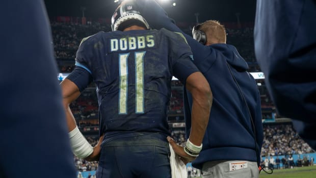 Tennessee Titans quarterback Joshua Dobbs (11) stands with offensive coordinator Todd Downing late in the fourth quarter at Nissan Stadium Thursday, Dec. 29, 2022, in Nashville, Tenn. The Cowboys defeated the Titans 27 to 13.